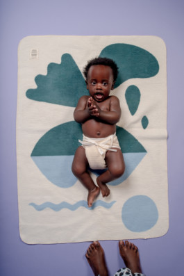 Cute baby wearing cloth diaper